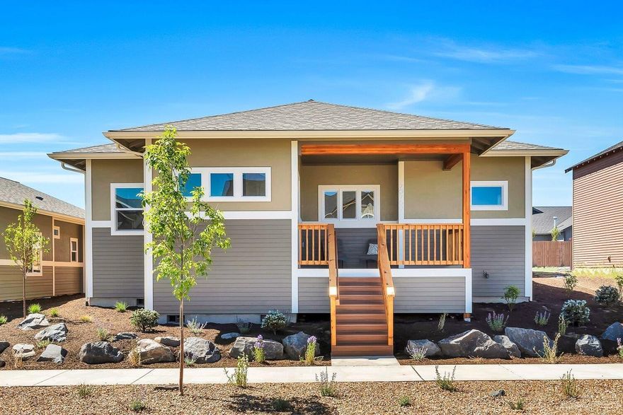 Arbor Builders' stunning single level, new home featuring a 3 car garage with alley access. The design provides elements of natural light, open floor plan, engineered wood floors SS appliances and custom cabinets. Built with environmentally conscious features, Earth Advantage Certification and solar electric and AC ready. Be the envy of your neighbors in this attractive single level home. Photos are of a similar home. COTTONWOOD plan.