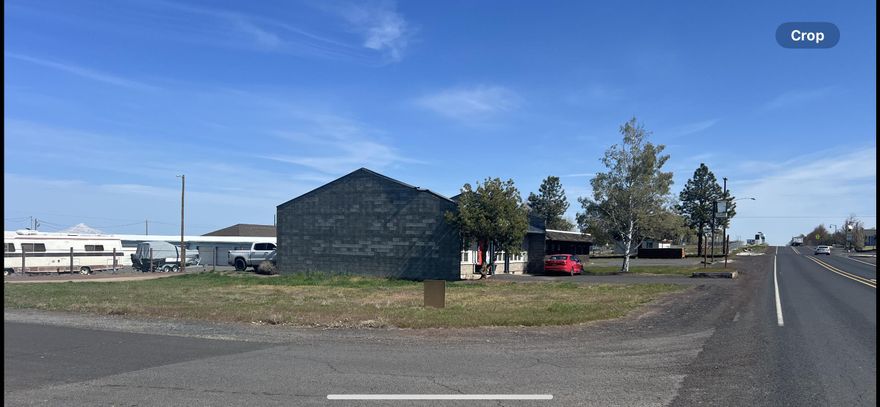 Corner lot in Metolius. Zero lot line commercial developments.