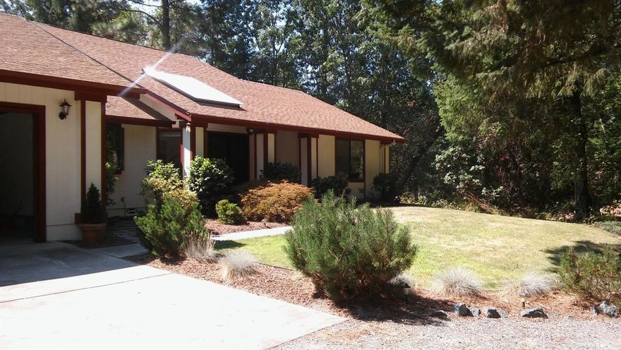 Location! Location! Location! Minutes from downtown--Amazing custom home sited on 2.53 level acres...Light and Bright Formal Entry opens to spacious living room! Like to cook? Easy to love well designed Cook's kitchen with island and separate built in desk area. Large Sun-filled Dining room completes this space! Need more storage? Separate laundry room offers floor to ceiling storage and we haven't even discussed the garages yet--Oversized 2 car garage--with a workshop space. Additional attached finished garage space could be third car garage or office, workout room, etc! Master bedroom and guest bedroom are great spaces--third bedroom is upstairs and comes with its own slider and crows nest to enjoy the private peaceful setting.