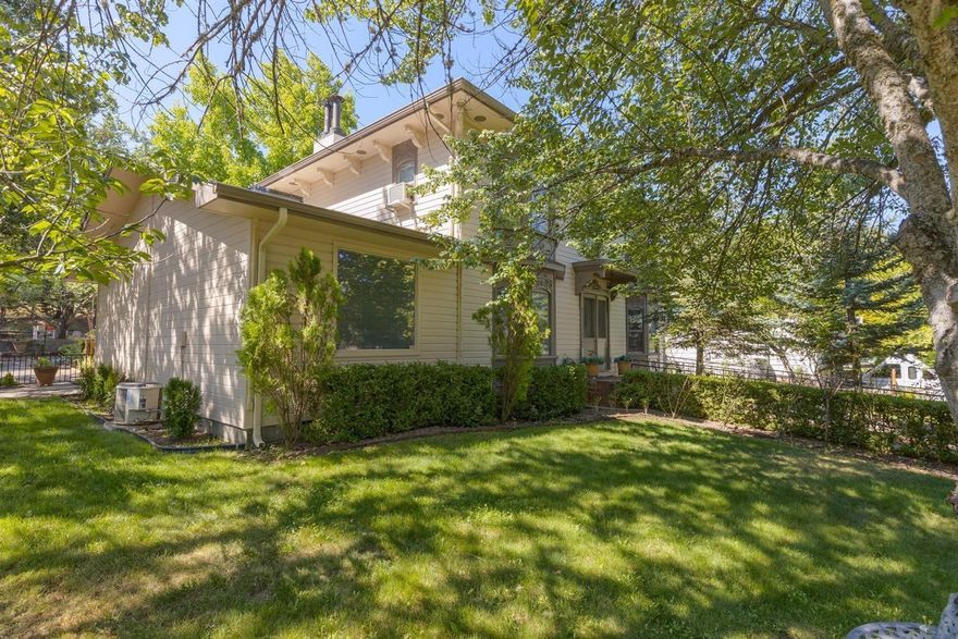 Beautiful Italianate style home with a detached cottage rental income of $1000/mo. situated on a large 0.29 acre corner site with TID Irrigation. Private estate like setting on the edge of town w/Mountain views & lovely gardens. Main home (2,360 sq.ft.), lots of updating in past several years. Main home has 3 bedrooms, 2 full baths & 2 half baths. Features include: Hd-Wd floors, bay windows, new stainless steel appliances, new quartz counter tops, French doors, spacious Master Suite & possibility for a 2nd master suite on main level. Home also has a (980 sq.ft.) basement stg/workshop & garage. Beautiful detached 1 bed/1 bath (858 sf) Guest cottage/Rental (Legal 2nd Unit) w/separate power meter)and separate address (1451 Tolman Creek) with excellent rental income history. Great 2 Family set-up with lots of possibilities. Charming patio, fountain/pond. Beautiful mature landscaping & trees, raised garden beds & greenhouse w/fan, RV Parking and room for shop/garage off Tolman Creek Road.