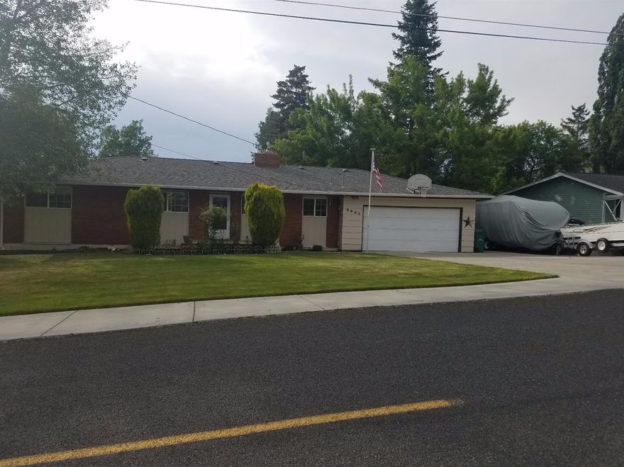 Immaculate Home In Moyina Heights Lots of Updates in this 3 bedroom 3 bath home Dark Cherry Cabinets in the Kitchen, Tile Countertops, Stainless Appliances with a new Cook top and Microwave, Pantry Master on the main floor, with updated master bath Office or use as a formal dining if you choose, with Hickory built-ins Ample storage in this home ! 2 Living areas with Gas Fireplace, Game room, Huge Laundry room Beautiful decks for outdoor entertainment, Park Like yard, Fully fenced, RV parking , double gate access to backyard, New storage shed, covered porch. Also extra parking areas MUST SEE ! Asking $ 229,000.00