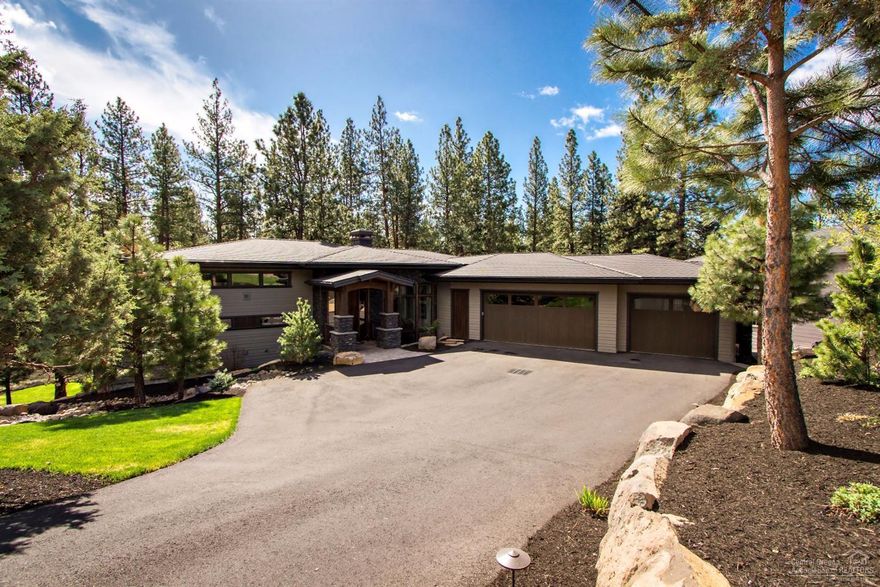 Gorgeous, award winning NW contemporary in private setting offers a fantastic alternative to Tetherow with incomparable value and more exclusivity. Large window areas, contemporary design features create a bright and attractive interior. Great room opens to covered paver deck w/ firepit. Island kitchen has quartz counters, custom cabinets, SS appliances. Luxurious master and guest ste on main. Earth Advantage Platinum rated. Surround sound, massive 3-car garage, storage areas. Backs to forested common area.