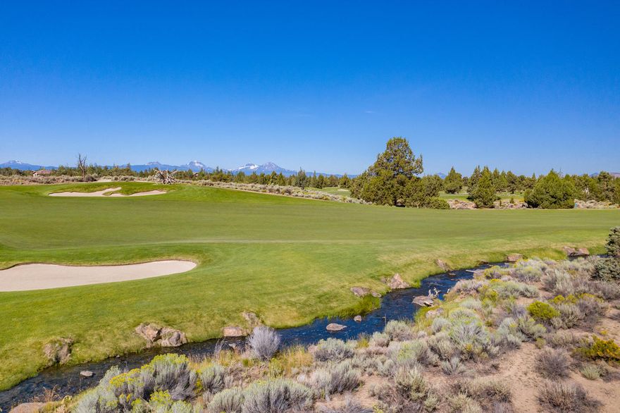 If you build here... You'll relish in the Mountain Views of the entire Cascade Range from the Main Level of your Home. Hear the sounds of the creek flowing.... at the course edge. Enjoy Views of the Nicklaus #8 fairway and 6th tee box. This site lies adjacent to only one homesite that's already built on.
It's located in very close proximity to the Pronghorn Clubhouse and all the core amenities via the street or cart path. Including 36 Holes of World Class Golf: Two Championship Golf Courses, Fazio & Nicklaus, Dining & Cocktail options, Intimate Day Spa, Pools, Fitness Center & Tennis Court, Dog Park, Bike and Walking Paths, Concierge Services, a 24-hour attended Gate House, and The Huntington Lodge Hotel. 
 Seller is including $90,000 towards Pronghorn Premier Club Membership.