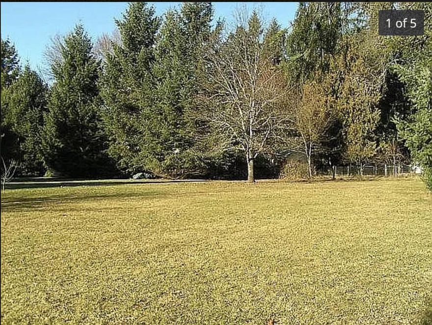 Beautiful flat 0.89 acre lot on a quiet road off of Rogue River Hwy. Mature trees at the front of the property offer privacy from the road. Near the Rogue River. This lot has been lovingly maintained by the next door neighbor and is one of the only vacant lots left in the area. Irrigation rights for the property provided by GPID. Ready for someone to come and build their dream home. Bring your builder and your vision for your new frame built or manufactured home.