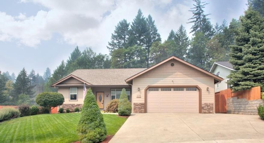 Impeccable inside and out! Custom built for these owners, this 1794 sf home is a one level, 3 bedroom, 2 bath with split bedroom floor plan. Immaculate and perfectly cared for, your tour begins with a covered front porch, vaulted Living Room, ceiling fan, decorative plant shelves, spacious and bright Kitchen with garden window, granite counter tops, island, stainless sink and appliances, custom hickory cabinets with specialty drawers and pull outs, Dining Room with French doors to the large covered patio overlooking a beautifully landscaped backyard with a backdrop of tall trees for privacy! Large Master bedroom with doors to the patio, walk in closet with shelving and a ensuite bathroom with shower and double sinks. The laundry room features cabinets, sink and built in ironing board. Quality shines throughout with custom doors, lots of storage, and many nice extras. Attached garage, garden shed, decorative pond, sprinklers and drips. You'll want to start packing!