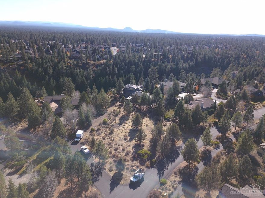 Would you like to build your dream home close to skiing, biking AND be close to downtown Bend? Not interested in a tiny lot? If so, then check out this amazing corner lot in desirable Sunrise Village. Flat, easy-to-build upon, & close to all Bend is famous for. Nearly half an acre in a family-friendly neighborhood. Walking/biking paths, tennis courts, pool & community center. Builder/owner is even willing to offer a guaranteed position in his build schedule for Spring/Summer 2018 & a discounted fees!