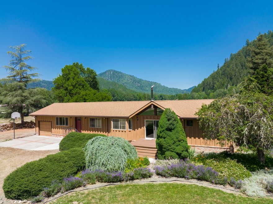 Pride of Ownership Shines! This immaculate property & ranch style home offers too much to list! 1830sqft 3bdrm 2bthrm. Entry welcomes you to knotty pine walls & Italian tiles throughout most of home! Kitchen has great counter space w/island, garden window & breakfast bar! Dining area & vaulted knotty pine open beam ceiling in spacious living room, gorgeous rock fireplace w/insert, sliding glass doors out to deck perfect for entertaining & star gazing! Desirable Split Floor Plan, primary en-suite w/jetted tub & walk-in closet! Guest bthrm has computerized steam shower! Pole barn w/hay storage, feeding trough & 
caregiver qrtrs. Irrig. rights, Cow crk, pond fills from 1900's commercial ditch. Metal Barn 60x60 2 horse stalls, 2 storage rooms, 220V. Chicken coop w/garden shed. Estab 8' fenced garden, fruit trees, 8x10 greenhouse. Sauna cabin w/outside shower. Starlink high speed internet! 5 level ac. around home, 10ac. timbered backs up to BLM & 20 level ac. Pasture w/hay. Not a Drive by