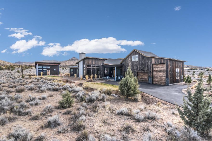 Beautiful home located at Brasada Ranch.  This ''mountain-modern-rustic'' home has 3 bedrooms and 2 bathrooms in the main home and features a detached 432 square foot ''casita'' complete with another full bathroom.  Building design features 16'-foot ceilings in living room, floor to ceiling fireplace, open concept design with heated concrete floors and ship-lap walls.  Enjoy mountain views from this single level home. Completely finished attic space above the garage makes for a great bonus room.  Additional features include: butler's pantry, covered back patio, custom fire pit, RV garage, ductless heating and cooling.