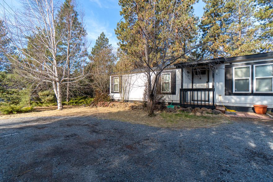 Nestled in the mature pines of south Bend just west of Brookswood. Minutes to the Old Mill & downtown Bend, this home offers a convenient location & plenty of space to call your own. Home is well maintained w/an open floor plan, large bedrooms & great separation! Detached double car garage, RV parking & green house. Huge fenced back yard & easy to maintain landscaping. Home is priced to sell & sold as you see it!