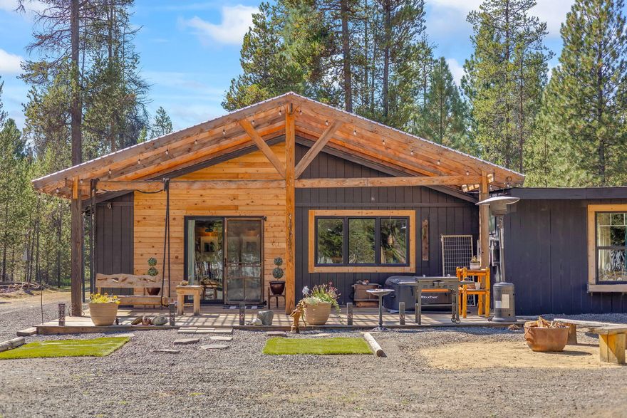 Nestled on 1.62 acres, this spacious five-bedroom, two-bath home offers a unique blend of flexibility, comfort, and room to grow. The expansive corner lot provides endless possibilities, from RV hookups and gardening to creating the perfect outdoor retreat. Step inside and discover a versatile layout designed to adapt to your lifestyle, featuring multiple living areas, bonus rooms, and two kitchens that make dual living, extended family, or work-from-home arrangements a breeze. Upgrades have been made over the years, enhancing both function and charm. With so much space to spread out, this home invites you to imagine gatherings with loved ones, peaceful evenings under the stars, and the freedom to create the lifestyle you've been dreaming of. Whether you're looking for extra room, multi-use spaces, or simply a property that feels open and full of possibility, this home delivers it all.