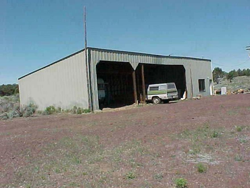 Power, Well, Septic Are In. 30x60 Machine Shed, 24x24 Barn, Old Single Wide Needs To Be Replaced With New Home. 60 Gpm Well With Excellent Water. Located On Historic Oatman Flat.