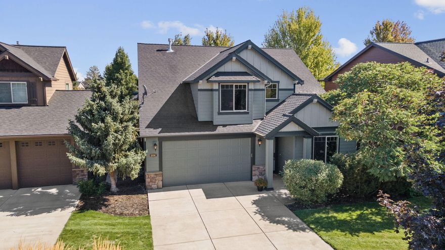 Sought after Primary Bedroom  the Main Level meets prime Redmond living in this Fieldstone Crossing gem! While the upstairs front bedroom capture mountain views during late autumn and winter. Recent improvements include fresh interior and exterior paint, new carpet throughout,and four replaced windows. Step easily from the open kitchen & dining area to the covered patio and transformed backyard which is complete with lush grass, colorful plantings, shrubs, trees, and a spacious patio. Front office with plenty of natural light plus privacy from trees and hedges will keep you productive and inspired. Residents enjoy community amenities including a pool, front landscaping service, and direct access to the Homestead Canal Trail. Just minutes to Dry Canyon Trail & Dry Canyon Dog Park and Downtown Redmond, this home is surrounded by mature landscaping and offers a serene retreat with room to entertain and enjoy every season.