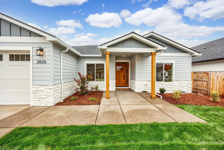 Beautiful brand-new construction home located in a great East Medford neighborhood. This well-built home features an open floor concept, 4 bedrooms, 2 full bathrooms, spacious
entryway, high end flooring, great finishes, tankless water heater, and abundant lighting. Large living room offers a gorgeous gas fireplace, large windows & double glass sliding doors.
Gourmet kitchen has a large island with an eating bar, quartz counters w/tile backsplash, gas range/oven, walk-in pantry, soft close cabinets & pull-out drawers. Primary bedroom offers a tray
ceiling with ceiling light/fan, glass door that leads out to the back patio, attached bathroom with dual sinks, quartz countertop, huge tile shower, soaking tub, private toilet, linen cabinet and
huge walk-in closet. Guest bathroom offers quartz countertop, tile shower and tile flooring. Large utility room has wonderful cabinetry and tile flooring. Backyard offers a covered patio, lawn area and fencing. Move-in ready.