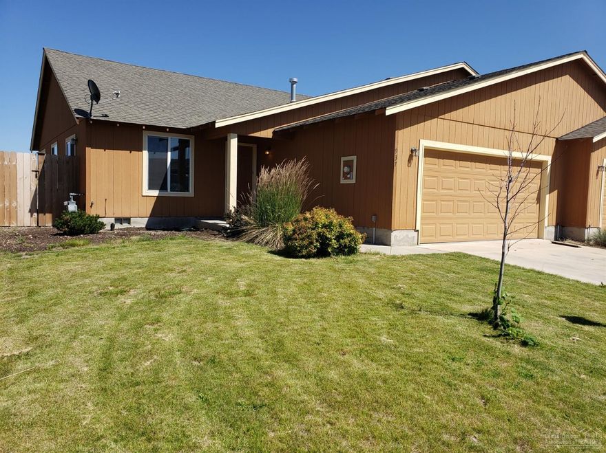 Very affordable living, great for rental investment property or for first time home buyer. 1,266 SF with easy access to schools, parks, trails, and the Madras Aquatic Center. This home is one level, no stairs, 3 bedroom, 2 bathrooms and great floors. Two car garage and landscaped yard with automatic sprinklers and fenced. Don't miss this great opportunity to be RENT FREE.