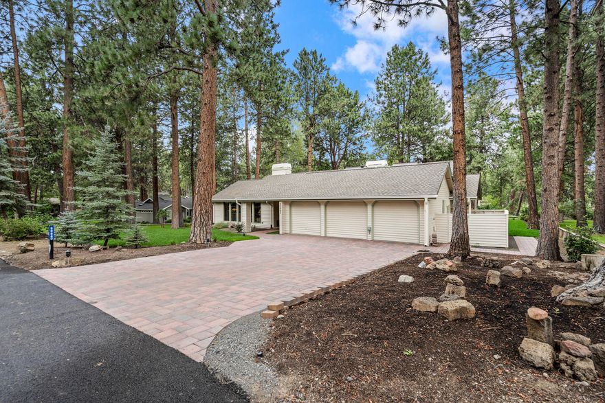 Make this single level house your home in the wonderful Mountain High Estates gated community with golf, pickleball, & many other fun amenities! The paver patio with pergola out back is perfect for entertaining guests among the mature pine trees and immaculate landscaping. The  interior has plenty of natural light and skylights. Beautiful laminate flooring throughout the main areas, a newly added half bath and office, a jetted tub in the primary bathroom, stainless steel appliances with granite countertops in the kitchen! Work simplifying amenities i.e. leaf guard gutters so no pine needles to remove, motorized shades on most windows. All trees have been crowned and trimmed. The exterior has been painted & caulked recently.  Recirculating hot water on timer and a wifi security system. The furniture is negotiable. Part of the three car garage is an office and not included in square feet, can be converted back as garage space.