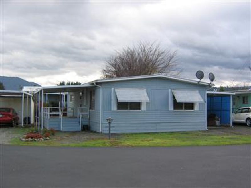 River Haven Mobile Park. Clean 2 bedroom, master has huge walk-in closet, 1 good size bath with 5 ft shower, large covered deck and carport, plus a private covered deck off 2nd bedroom to enjoy your own fenced backyard. Storage shed. Offers subject to park approval.