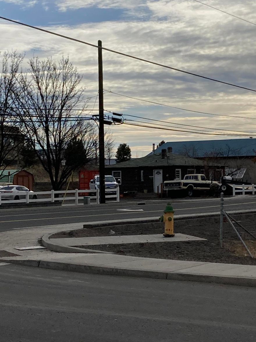 This property is the current location of an existing Landscaping Business which is not for sale.  900 +/- sq. ft.  older home has been remodeled for an office.  The 1680 +/- sq. ft. detached shop has overhead doors, concrete foundation & metal roof.  This approx 1/2  lot has lots of room for outside storage & parking.  It is an excellent location for many types of businesses; C1 commercial allows Auto Detailing, sales & repair, printing, publishing, telemarketing, retail sales, contractors supplies, equipment sales, pet shop, plant/nursery, Mini Storage, Vet Clinic and many other possibilites!