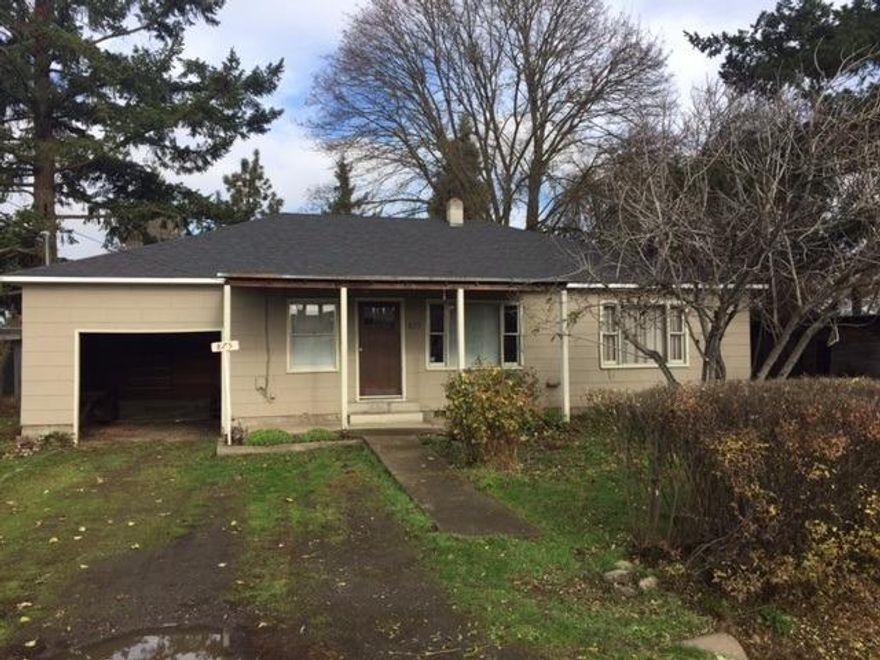 When you want a really well built home with character, and a huge .39 acre lot with room for a workshop and home business or just elbow room in city of Medford, look no further! This property has general industrial zoning but is located in an area of mostly residential. Per seller, nice mix of gleaming hardwood floors, vinyl and carpet; storm windows throughout, new roof approx. 3 years ago; new hot water heater within the last year and new central heat and air approx. one year old! Mature landscaping including olive tree, fig, cedars, magnolia, more! Several large to smaller sheds on property.