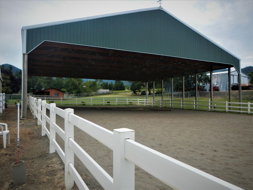Exquisite horse lovers dream with vineyard and mountain views. This newly remodeled home has fresh paint throughout. Neutral granite, tiled and new laminate flooring, cabinet pullouts and stainless-steel appliances. Kitchen opens to a large a large family room with wood burning fireplace. The master bedroom has remodeled bathroom, skylights and big walk-in closet. Second bath offers a jetted tub. The outside features large patio with mature landscaping front and back. Newly asphalted circle drive and 114x12 RV area. Just over an acre which includes: 3-stall insulated barn with hay storage and 2-concrete tack rooms; 84x66-sand filled covered arena, corral with electric cross fencing and fenced pasture. Still room for raised garden beds, firewood storage and 2-sheds. All of this on just over 1 acre. In upscale neighborhood. Property is irrigated and has public domestic water. Don't miss this one.
