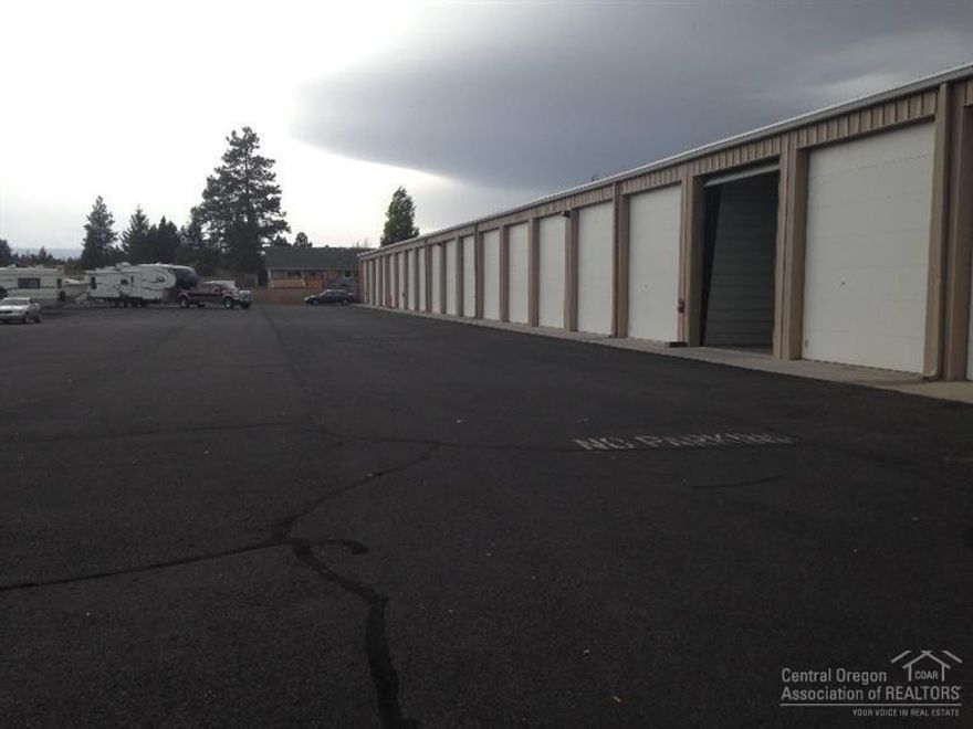 Constructed in 2006, this Industrial Condominium measures 15' wide & 40' deep allowing for storage of high end motor coaches, RVs, or multiple boats & trailers. Each unit is separately metered with natural gas and electricity, and is sprinkled with a full fire suppression system. Each unit has one 14' roll up door. Access to the unit is provided by a private security gate with wireless remote & key pad access. The site includes a large private turnaround area turnaround area.