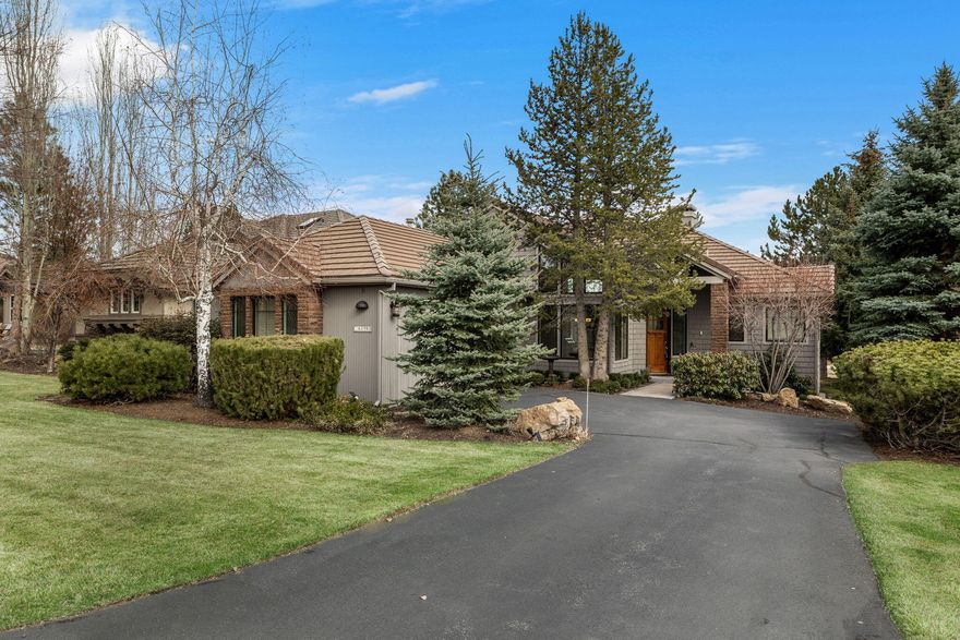 Lovely, warm and charming SINGLE LEVEL home overlooking the 5th fairway and pond in the desirable gated, golf community of Broken Top. The light, bright and airy great room is graced with soaring ceilings, beautiful new maple hardwood floors, a gas fireplace & an expansive wall of windows, bringing the outside in and offering wonderful views of the course. Kitchen features all new stainless steel appliances and a cozy breakfast nook with built-ins. Spacious primary suite with vaulted ceilings, two closets, radiant heated porcelain tile, soaking tub and with access to the large back deck. Garage is conveniently heated with storage cabinets and work bench. HOA covers front & back landscaping and driveway snow removal for a low maintenance lifestyle. More time to enjoy the Club, restaurant, the miles of trails within Broken Top & with membership golf, pool, pickle ball, tennis and fitness center. What a lifestyle!