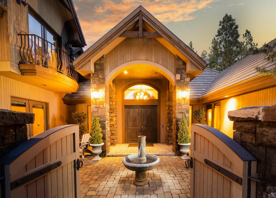 Single level living Broken Top home offers impressive balance between NW Mountain Home & European Villa architecture.  Gated front courtyard is the welcoming heart of the home, seamlessly connecting the comfortable interior living spaces w/ outdoor terraces.  Nestled on ½ acre w/golf course views & abundant privacy. Interiors are characterized by clean lines, flowing floor plan & superb finishes. Grand entrance opens to golf course views from spacious living room, dining, sitting room & kitchen, w/ Viking cooktop, double ovens, warming drawer, prep island & brkfst bar.  Entertain at full bar, loft & media room, that can function as an addtl guest suite.  Owner's suite features fireplace, private terrace & palatial bath.  Two  full-ensuite guest-rooms w/ built-in desks & an Office w/ fireplace, desk & private courtyard entrance.  Covered patio features golf course views, firepit terrace & outdoor kitchen. Premier gated golf course living minutes to Bend, Mt Bachelor & Deschutes River