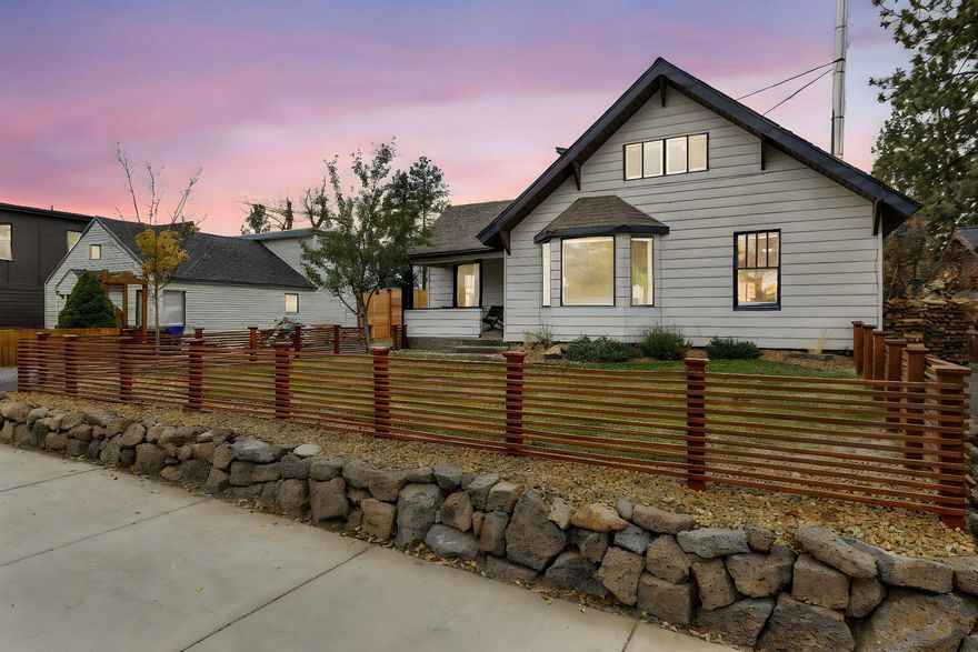 Situated on a lot in the sweet spot between downtown Bend and the Old Mill, this charming four-bedroom home offers the ultimate Central Oregon lifestyle. Just blocks from Miller's Landing and Drake Park, you can leave the car behind and walk to the river, restaurants, shops, and trails. Inside, the home radiates warmth with beautiful fir floors and an updated kitchen and bathroom. The functional layout is packed with ample built-in storage, while the second story offers delightful peek-a-boo mountain views. Enjoy your morning coffee on the covered front porch or relax in the private, fully-fenced backyard featuring a paver patio and lawn. This property is also in the coveted Priority Enrollment Zone for Amity Creek Magnet School. Ideally situated in the heart of town, this home is your front-row seat to everything that makes Bend amazing!