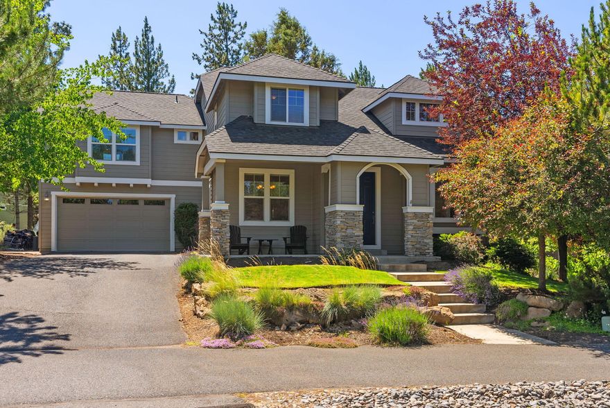 Set on a large .29 acre lot in the Parks neighborhood, this beautifully maintained, single-owner, home offers space, privacy, and peek-a-boo Cascade Mountain views. Backing to protected open space and surrounded by mature landscaping, the setting feels peaceful and secluded—yet you're still close to everything Bend has to offer. 
Inside, the main level features hardwood floors, a formal dining room perfect for hosting, and kitchen with brand-new appliances. Upstairs, the spacious primary suite includes a private deck, while two additional bedrooms and a full bath complete the main wing. A separate back staircase leads to a generous bunkhouse above the garage. Features included: built-in cabinetry, private deck, an attached bedroom and full bath, perfect for guests or multi-generational living.
Enjoy brand-new decks completed in June 2025, and take full advantage of the neighborhood's scenic trails, open spaces, and community pool.