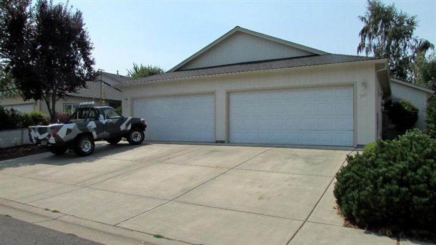 Opportunity is knocking~ don't miss out! Wonderfully well kept and easy to maintain this great zero lot line property is perfect for an investor or an individual wanting a nice place to live while earning additional rental income. Each side features an open floor plan and is 1,064 sq. ft. with 2 nice sized bedrooms and 2 full baths. Another feature... a fully finished 2 car garage and patio/ yard area .... great for barbecues or just enjoying our wonderful Southern Or. outdoors. Make an appt. today for a tour! Entire property priced at just $299,900. Or can be purchased individually ~ contact listing agent for details.