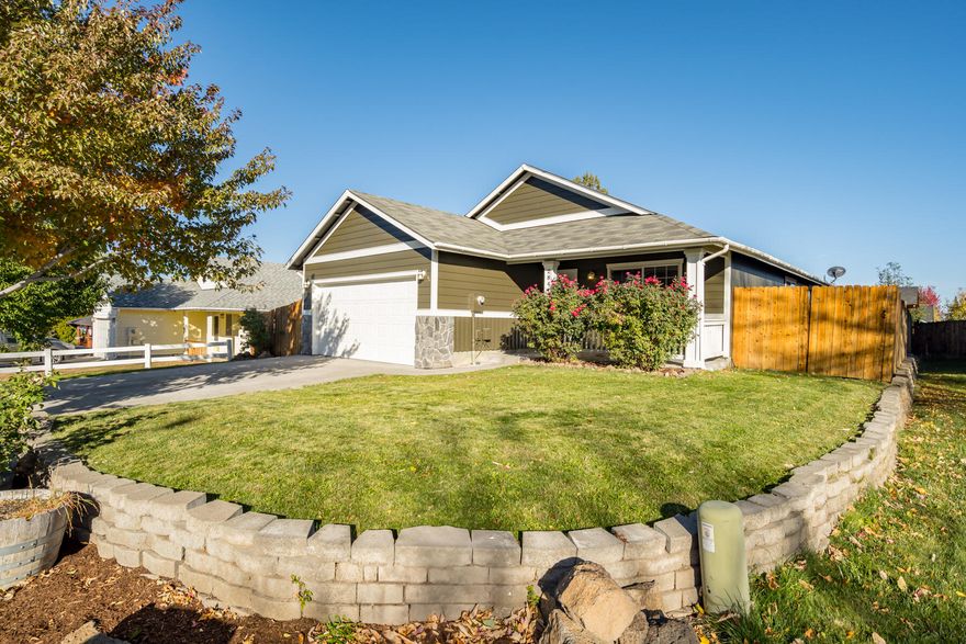 Discover this must-see single-level 3 bedroom, 2 bath home ready for your personal touches! Nestled in a desirable central Redmond neighborhood, you will enjoy easy access to schools, parks, shopping, and local amenities. Freshly painted inside and out. This move-in-ready home sits on a nicely sized lot featuring a spacious deck, perfect for entertaining or relaxing outdoors. Enjoy mountain views from the front yard and a peek-a-boo view of Black Butte from the backyard. Whether you're searching for your first home, looking to downsize, or seeking a great investment opportunity, this property is a fantastic find!