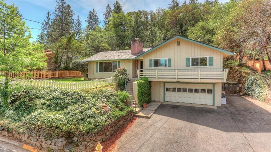 Beautiful view property above the boulevard. This well cared for home has had many upgrades over the years, including replacement of the heating and air system, counter tops, refaced kitchen cabinets as well as a new roof and refinished oak floors in 2015. Plenty of storage as each bedroom has nice built-in closets and shelving & drawers. Other features include fireplace, oversized two-car attached garage with workshop & half bath, RV parking with electrical hook ups, private backyard with patio, storage shed, .27 acre lot, large north facing deck with amazing views of Grizzly Peak and much more.