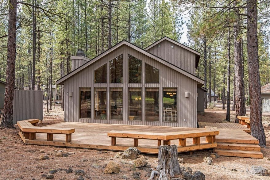 Own 1/3 share interest in this chalet in Glaze Meadow, overlooking 7th golf green. River rock fireplace, hardwood flooring, blue buggy siding and log accents create a cozy cabin in the pines. Plenty of cabinets in this cook's kitchen with granite tile counter tops and ample seating at the breakfast bar. Double car attached garage.