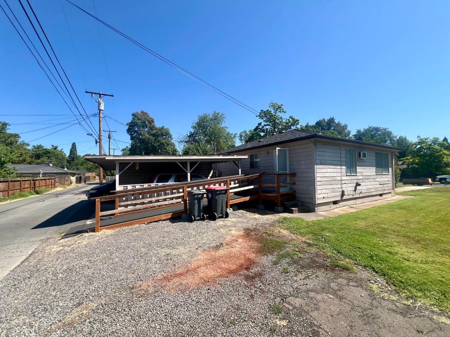 Well-maintained 1957 duplex in a quiet Medford neighborhood, offering two 2BD/1BA units with single-car carports off a private back alley. Totaling 1,820 SF, the property features separate gas/power meters, no HOA fees, professional management, and attractive landscaping. Unit #1 includes a wheelchair-accessible ramp; tenants in place since Jan 2023 and May 2011, each paying $1,295/month. Convenient to Jackson Elementary, Hawthorne Park, and downtown Medford. A turnkey investment with long-term rental stability.