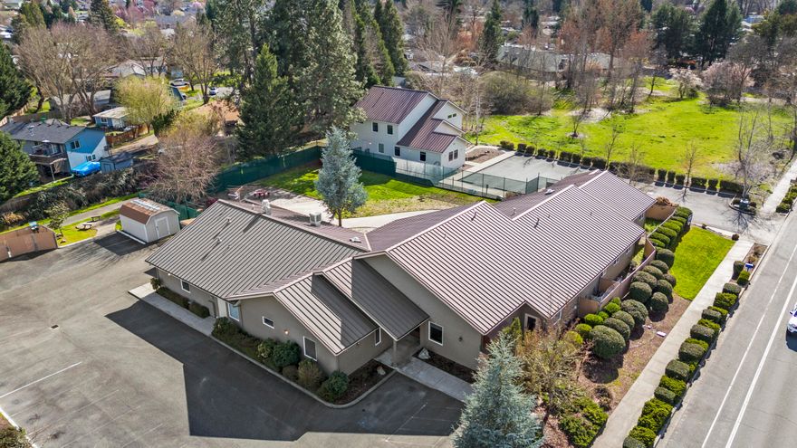 Very clean, well maintained 12-bed facility and office building. This was the previous site of Kairos psychiatric residential treatment facility (PRTF). Property is zoned R-4 with a Medical Overlay. The subject site is improved with two buildings totaling 11,000 of useable space sharing a 1.14-acre parcel and separated by an interior fenced courtyard; each building having separate Ramsey frontage and parking. Main bldg. has laundry, several classrooms, conference rooms, commercial kitchen, 12-beds and professional offices. Adjacent bldg. has several classrooms/conference rooms and offices. 

The two-building layout and amenities can accommodate a variety of purposes. Its distinctive attributes make it suitable for memory care, assisted living, women's crisis support, addiction recovery, early childcare, community or arts center and more.  Located within walking distance of Asante Regional Hospital & bus routes.