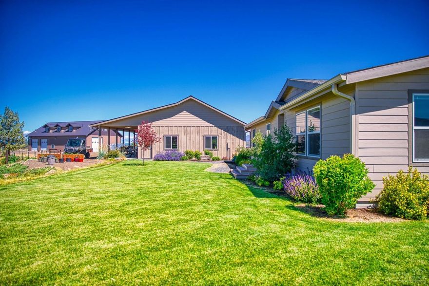 Desirable Powell Butte ranch on 186 acres with a full pivot. Newer triple wide with open great room, large open kitchen with eating bar, family room with beautiful cascade views, 3 bedrooms/2 baths and a large laundry/mudroom. 48 x 80 shop with 2 reznor heaters, a 12 x 12 pump room with laundry and 1/2 bath, 2 12 roll up doors and 4 14 roll up doors, 2 bedroom/1 bath living quarters above shop with nice upgrades.