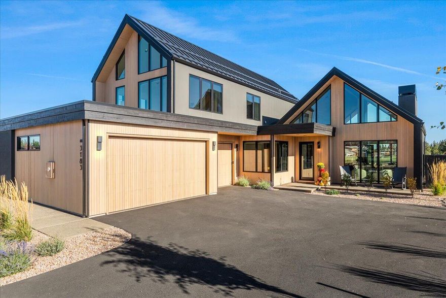 Live the Mountain town lifestyle in this ''better than new'' move-in-ready home in sought-after Discovery West in Northwest Bend,OR. This modern Scandinavian inspired home Built by Structure Development, has a primary bedroom and office on the main floor, and two extra bedrooms upstair with a light and bright bonus room with Mt Bachelor views. This home won the 2024 Tour of Homes Best Kitchen. It features European frameless white oak cabinetry, high-end appliances, and a spacious island. The great room has a tongue-and-groove hemlock ceiling and custom builtins around the fireplace. Two sets of tri-fold doors open wide to create seamless indoor-outdoor flow for dining and sitting around the custom fire pit. Perched on the ridge, this home offers privacy and amazing natural light. Walking trails lead to schools, shops, and world renowned mountain bike trails. A 3-car garage with epoxy floors and abundant cabinetry holds all of the necessary toys. Ask for the list of upgrades