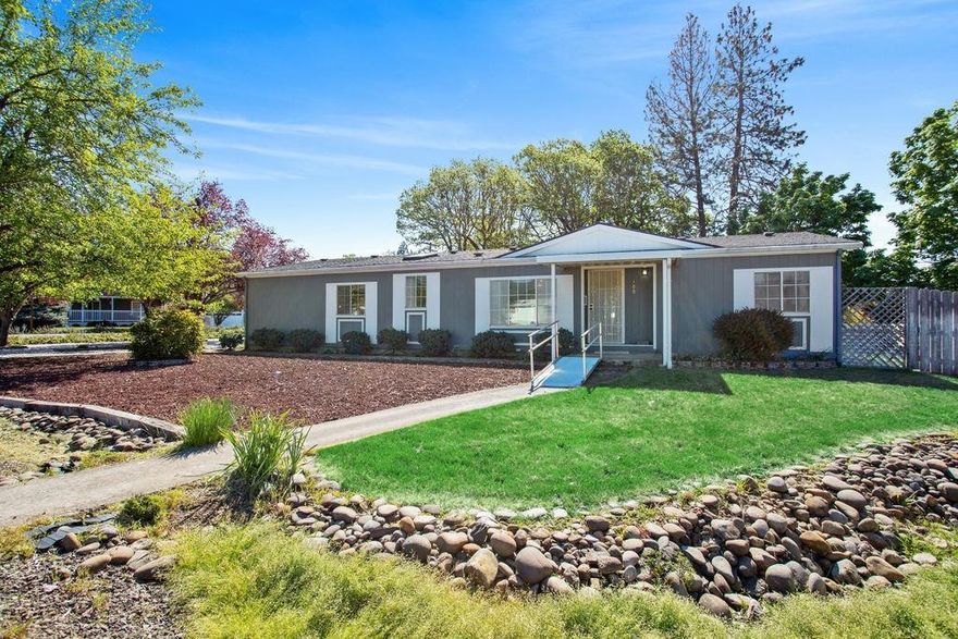 Lovely single-level home in the Deer Park neighborhood of glorious Shady Cove, OR. Enjoy a beautifully maintained backyard landscaped for your own private retreat that includes a sweet paved walking path. Home includes a 2-car garage and entry ramps at each door. Three bedrooms and two full baths. Formal dining room and breakfast area, a large kitchen island, utility/bonus room, and a nice master bedroom suite. Master bath includes a no-step shower that's perfect for any stage of life. Enjoy this quiet cul-de-sac just minutes from the mighty Rogue River!