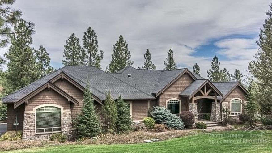 High quality home surrounded by trees above the Awbrey Glen golf course. This spacious home has crown molding details throughout, cherry floors and cabinetry, a professional kitchen, and a large main level master suite. The lower level features a large bonus room, fully wired media room, and designated wine cellar. Enjoy the quiet cup-de-sac landscaped with two ponds plus outdoor living spaces