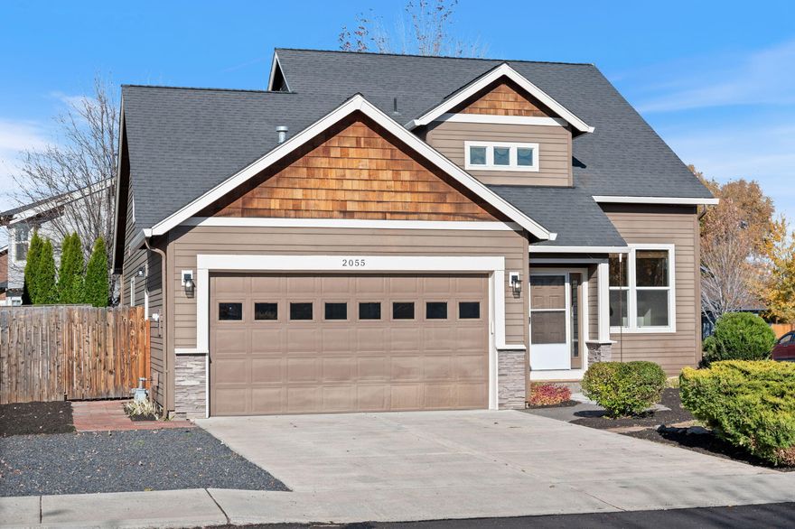 Located in NW Redmond, this 1,918 sq. ft. home rests on a beautiful corner lot and offers a welcoming great room with a gas fireplace and a kitchen that seamlessly connects to the dining area—perfect for gatherings and entertaining. The main-level primary suite features a walk-in closet and a private bath with a soaking tub. Upstairs, you'll find two additional bedrooms, a full bath, and a spacious bonus room. Enjoy the fully fenced yard with mature landscaping, just minutes from the Dry Canyon Trail, schools, and parks!