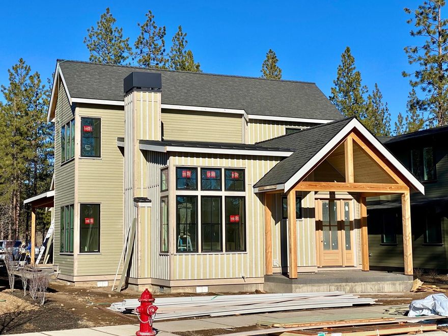 Beautiful Craftsman style home built by Tyee Development and Abbot Butte Contracting in Discovery West. Covered front porch leads to entry/great room with lots of windows of natural light. Kitchen features custom cabinets, beautiful appliances (GE and Bosch), slab quartz counters, wine fridge and pot filler. Main level suite with walk-in shower, soaking tub, and walk-in closet. Main level also features an office and laundry/mud room. Gorgeous hardwood floors throughout the main level and up the stairs. Second level includes two guest bedrooms, full bathroom and loft area. Double car garage with alley access, central vacuum system, A/C, this home has it all. Completion mid May 2022.