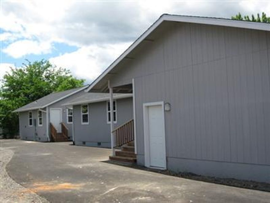 Two family set up. Perfect for large famly or investor. Front home is a 3 bed 2 ba. and back home is a one bed one bath. Great floor plans.