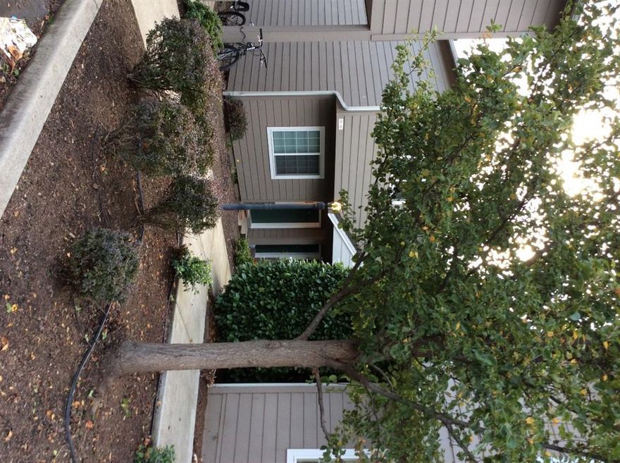 Great location - Perfect for the first time home buyer or investor. This 2 bedroom, 1 1/2 bath townhome, is an end unit, and one of only two units in a stand alone dwelling. Large bedrooms, closets, and huge upstairs laundry. Nice, private setting; covered back patio and locked storage. HOA includes water, sewer, garbage, basic cable. Unit #19, next door also available.