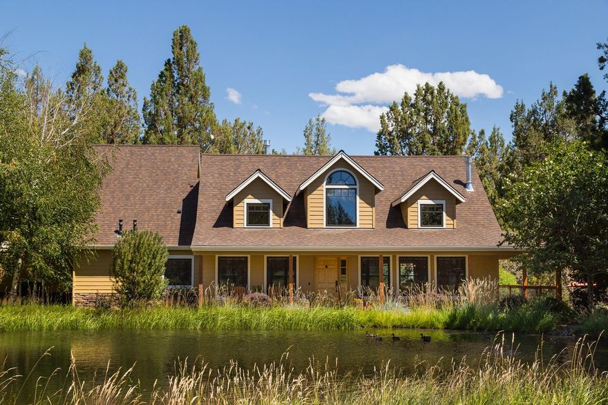 This stunning custom home lives new in a beautiful park like setting with multiple outbuildings, additional living quarters, & studio space in the desirable Tumalo community. Exquisite finishes throughout including built in speakers, hand trawled walls, wood doors, wrapped windows, and beautiful birch wood floors. The kitchen has a peaceful view to the east pond with water feature, slab granite counter tops, farm sink, 36'' Wolf oven & separate cook top. The spacious media room over the garage is not to be missed with vaulted tongue and groove cedar ceiling, surround sound entertainment system, built in bar area, & private balcony. This 6 acre property includes 5 acres of water rights covering the property through underground sprinklers & a drip system with 2 ponds. The whole property is fully fenced and cross fenced with 3 gates for vehicle access. It could easily be set up for animals with options for pasture areas. View additional pictures & information at www.GerkingMarket.com