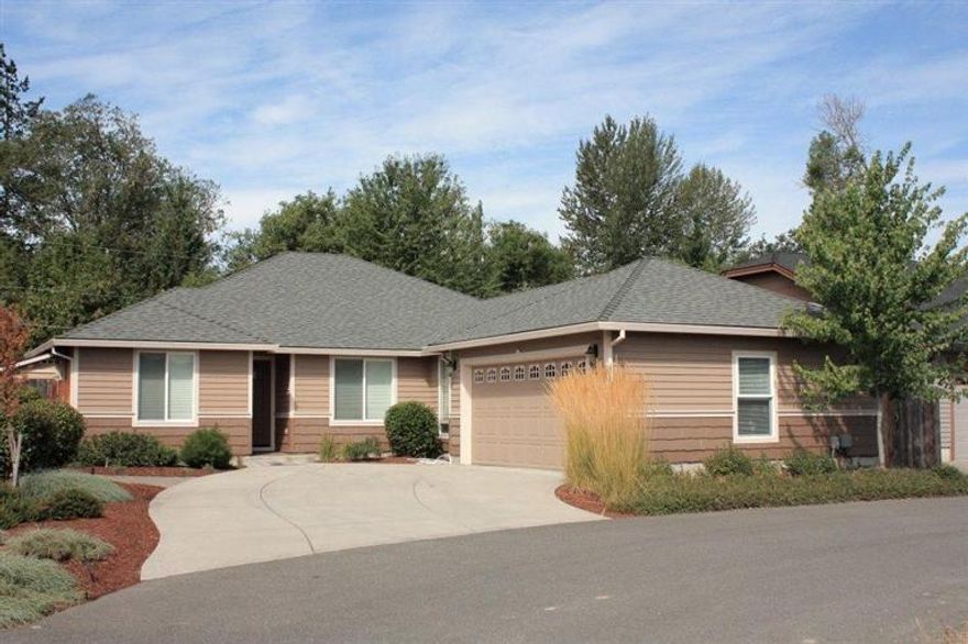 Better than new and ready to move right in! Built in 2008, this custom 1841 square foot, 4 bedroom 2 bath home is simply immaculate! The split floor plan includes living room with vaulted ceilings, corner gas fireplace, plant shelves with indirect lighting and French doors to a covered patio. Kitchen has range/oven with gas cooktop, built in microwave, dishwasher, stainless sink, open dining area and laundry room with sink and cabinets. Spacious master suite has ceiling fan, soaking tub, separate shower, double sinks, walk in closet with window and custom shelving plus three additional bedrooms and main bath. Central heat and air, custom window coverings, quality cabinetry, moldings and trim and many little extras for comfortable living! Professionally landscaped, low maintenance yard with sprinklers, drips, fenced backyard with storage shed, city services and schools. Close to shopping and medical facilities! A very special home in a great neighborhood of newer homes! Call Today!