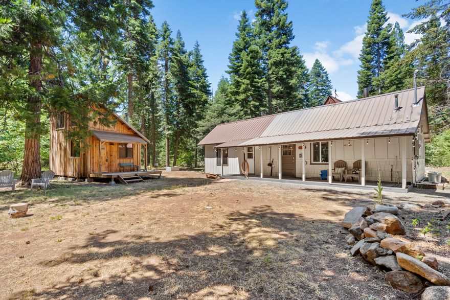 Great New Price! What an Awesome getaway! Clean air, Cool sunny days, and Crisp mornings in the Cascade Siskiyou Mountains. Close to Pacific Crest Trail, Pinehurst Elementary, Greensprings Inn and Tub Springs. Located off the highway, very quiet with tall pines, fir, wildlife and lots of wildflowers. 
Seller has installed an electric car charging outlet and upgraded many amenities, making the cabin a little showplace. You will be pleasantly surprised. Fresh Interior paint. private, comfortable and cozy cabin with an additional 221 sq.ft. structure with loft, 2nd wood stove and deck for  your art studio, work shop or office. Both wood stoves are certified, Deluxe storage shed of 102 sq.ft., propane heater in home, 7500 watt generator, good well, power and septic. Up down blinds, freshly painted, laminate floors. Great biking, hiking, cross country skiing and fishing near Hyatt and Howard Prairie Lake. Established community within 30 minute drive of Ashland