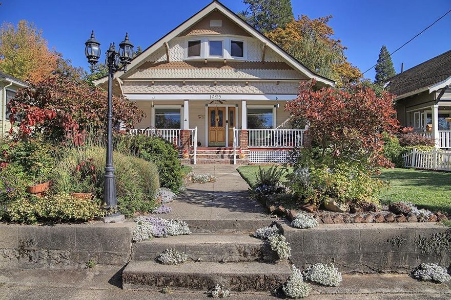 Classic Northwest Grants Pass Beauty! Located on THE coveted street near the downtown corridor, this wonderful home is a truly a step back to yesteryear. Featuring a large welcoming covered porch the home looks very stately from the street. Upon entering the cozy living room with fireplace, you will immediately notice the extensive use of wood throughout. Large dining room, 2 bedrooms, sweet kitchen and full bath on the main. There is an upstairs apartment as well as an unfinished third space that can be finished as hobby room or porch. Hardwood floors and tons of storage! The yard features an inviting inground pool. There are not very many homes that come available on this great street...don't wait - take a peek today! Buyer to do own due diligence.