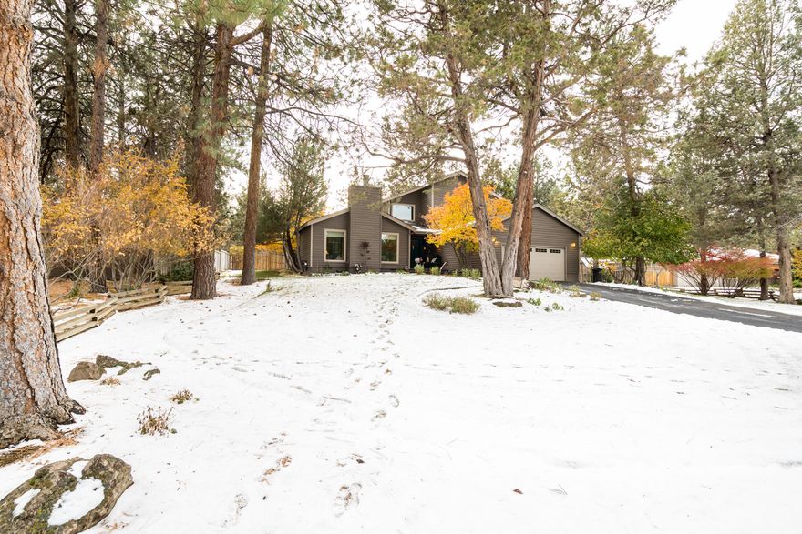 This is an ideal family home; lovingly cared for. It sits on a large lot in a quiet neighborhood. The inviting front entry opens into a formal living room with a gas fireplace. The formal dinning area looks into a small courtyard with a serine woodland like view. The primary bedroom is on the main level and has a large walk-in closet. The bathroom features a tub and large glass enclosed walk in shower. Upstairs are three bedrooms and a second family room in a loft. Overlooking the dining and family room  areas. The open concept kitchen and family room at the back of the house lead to a large deck with built in seating and bar-b-que area. This overlooks a lovely back yard that has been featured in the OSU Master Gardener tour. Send all the grandchildren for a sleep over in the Scandinavian style yurt in the back yard, and roast marshmallows in the center fire pit.