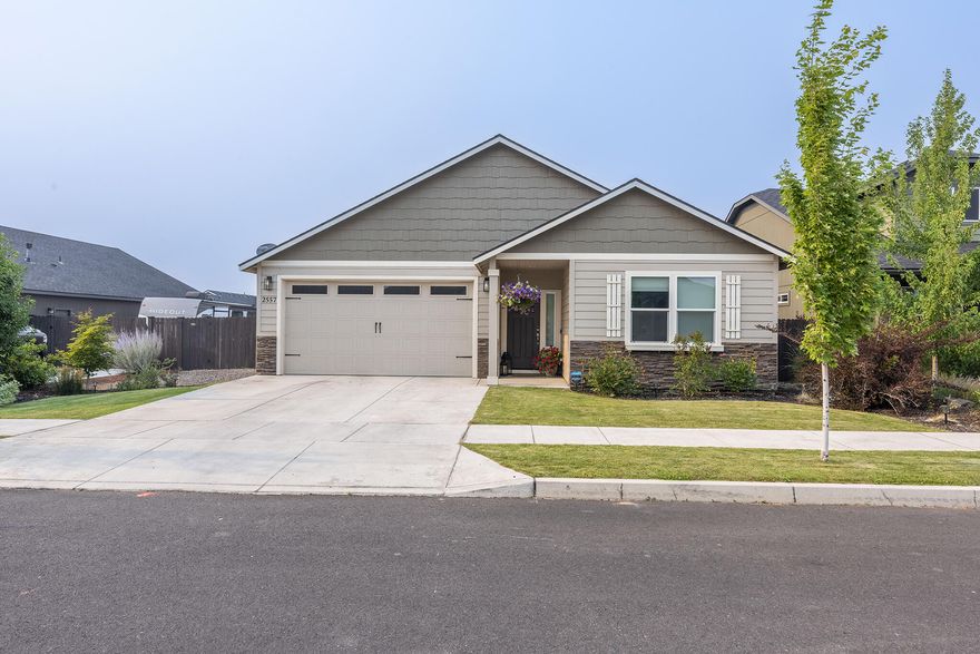Built in 2019, this 1979 sq ft, 4-bedroom, 2-bath home offers spacious, single level living with an open concept design ideal for both everyday comfort and entertaining. Located in NW Redmond, the home features vaulted ceilings, quartz countertops, and upgraded hardwood flooring throughout the main living areas. The open-concept kitchen is as stylish as it is practical, featuring a large walk-in pantry, a breakfast bar, ample counter space, and seamless flow into the dining area and great room. The private primary suite includes dual vanities, a soaking tub, walk-in shower, and a spacious walk-in closet.Step outside to enjoy a covered back patio and fully fenced backyard perfect for relaxing or hosting guests. With a two car garage and attractive curb appeal, this home is a must see!