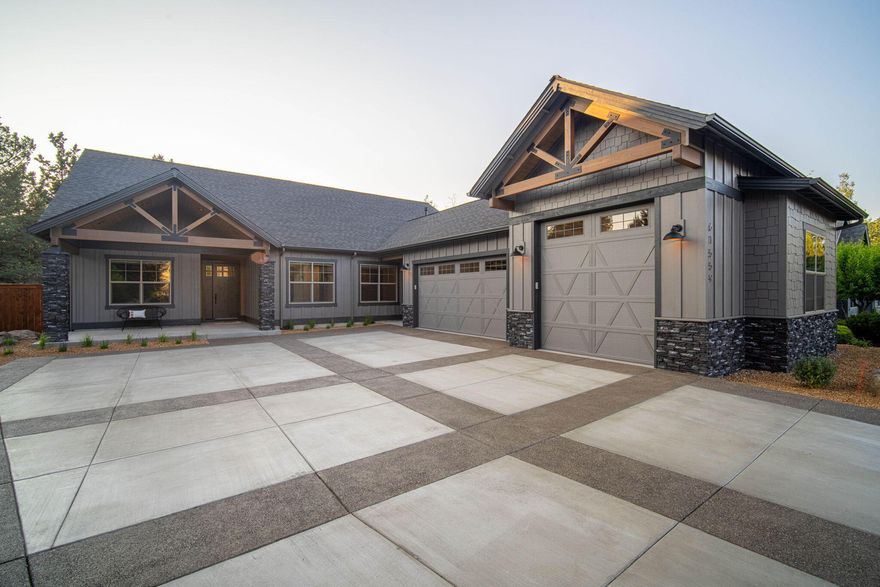 Finally, a luxurious new build on Bend's SE side! Featured on the COBA Tour of Homes, this mostly one-level home is sure to impress. You'll love the primary suite complete w/ zero-threshold shower, heated tile floors, custom walk-in closet, & designer finishes. Soaring ceilings, abundant triple-pane windows, gas fireplace w/ floor to ceiling tile surround, custom built-ins, wide-plank engineered hardwood floors, & more make up the great room. Ample custom cabinetry w/ dovetail soft-close drawers, commercial grade stainless appliances, pot-filler over 36'' range, quartz slab waterfall island & more stand-out in the beautiful chef's kitchen. All bedrooms + office on the main, laundry/mud room, flex space/studio off the oversized 900sf+ garage w/ RV/Sprinter bay & spacious bonus room upstairs complete a truly functional floorplan for all. Last but not least, the massive fenced & landscaped backyard w/ covered heated patio is a true oasis. Don't miss this rare beauty.