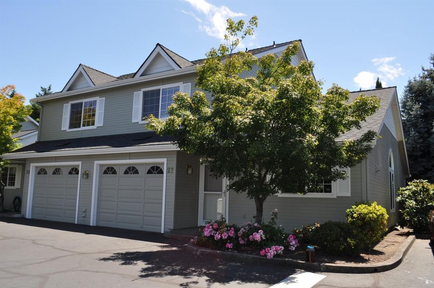 Beautiful townhome in the East Ridge Village Community! This end unit townhome is filled w/upgrades! Home features a main floor master bedroom w/the master closet expanded to include the washer & dryer inside (instead of the garage) & custom closet packs for more usable space. Master bath was upgraded w/new tiled shower, floor & countertops, new fixtures and lights & a built-in floor to ceiling cabinet (w/a lower pass thru to master). Open floor plan w/vaulted living room w/new flooring & wired for surround sound. Kitchen upgrades include: expanded kitchen, granite counters, refinished cabinets w/pullouts for pantry storage & trim & pulls, instant hot water, laminate flooring & light fixtures. New French doors open to a nice fenced/gated backyard for pets. Upstairs has 2 more bedrooms & another bathroom. One upstairs bedroom has a custom built-in desk, file drawers & is wired for surround sound. Enjoy your afternoons at the community pool or club house! Listing agent related to seller.